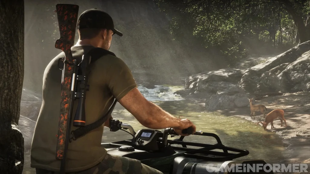 Jason riding an ATV through a wooded creek