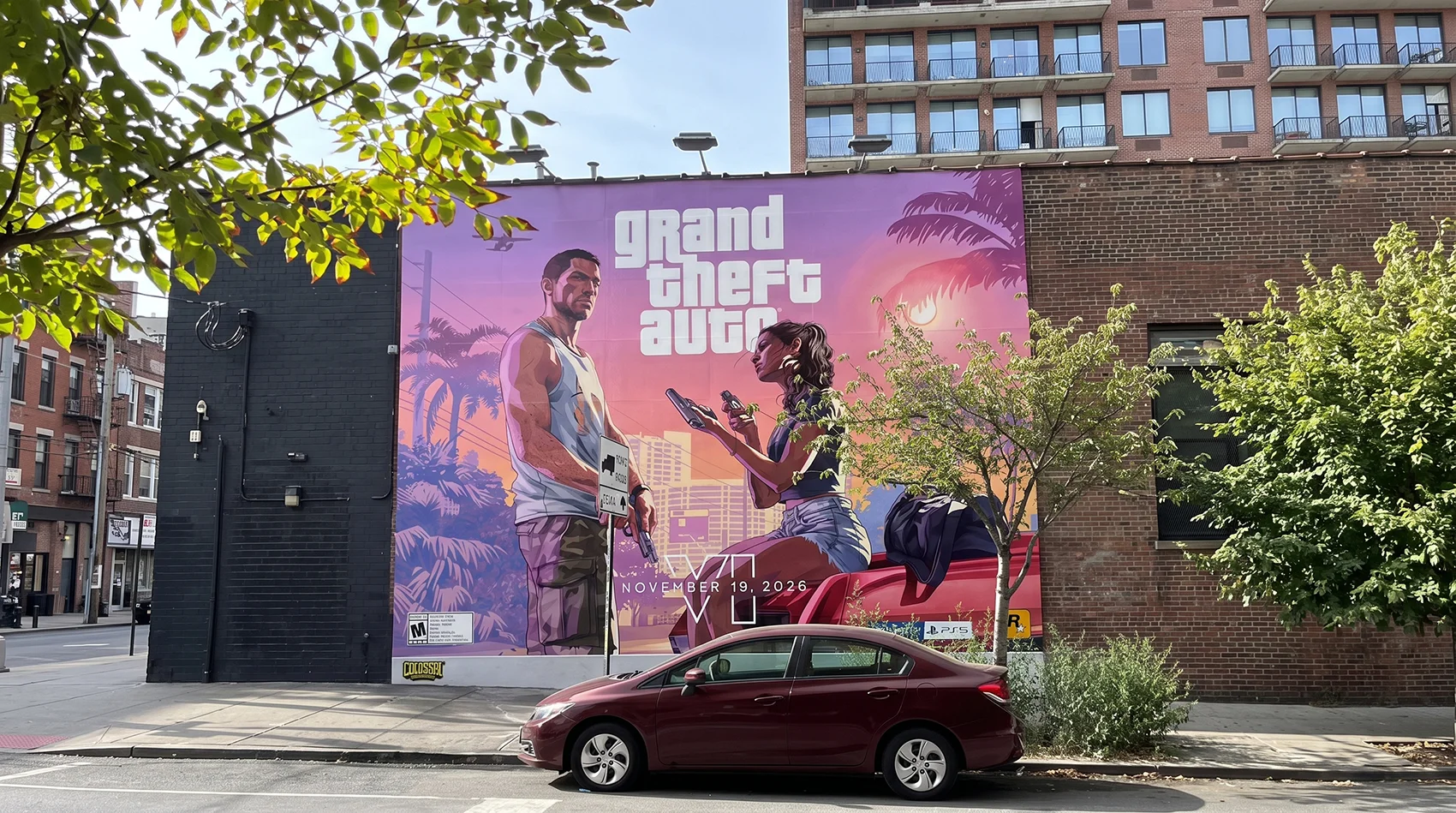 Jason and Lucia painted onto a Brooklyn facade.