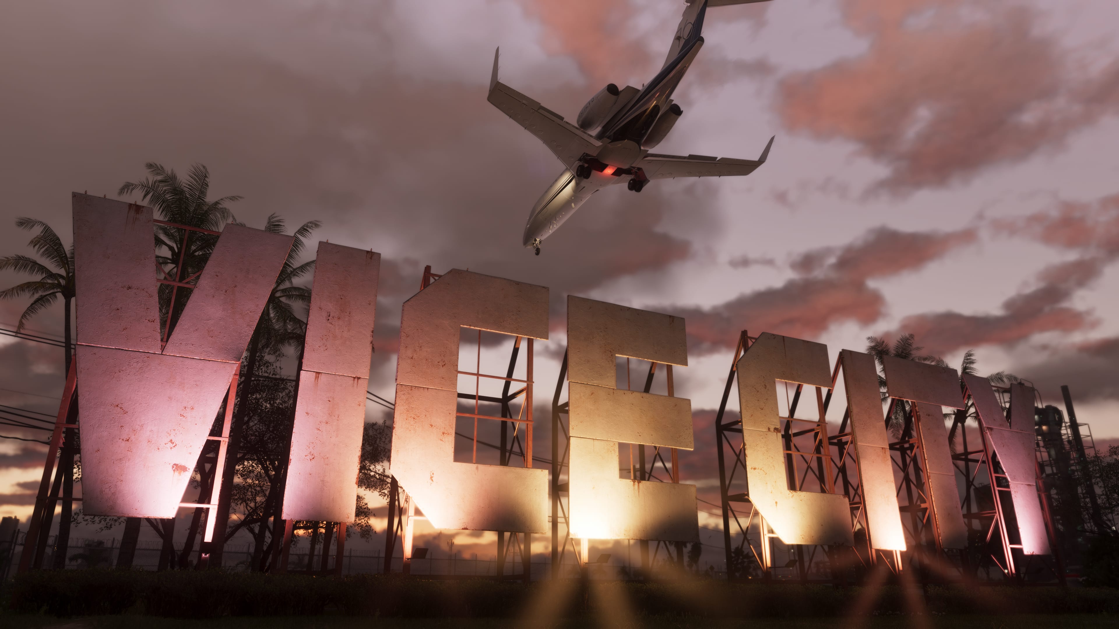An airliner above the Vice City sign at sunset